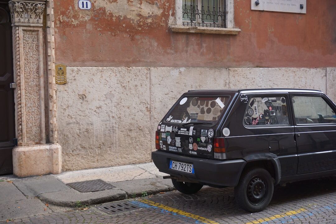 Vintage car parked on a cobblestone street in Colonia del Sacramento