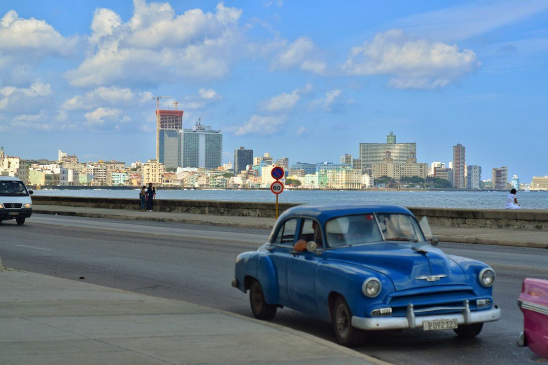 Coastal road near Jose Ignacio with a classic car driving at sunset
